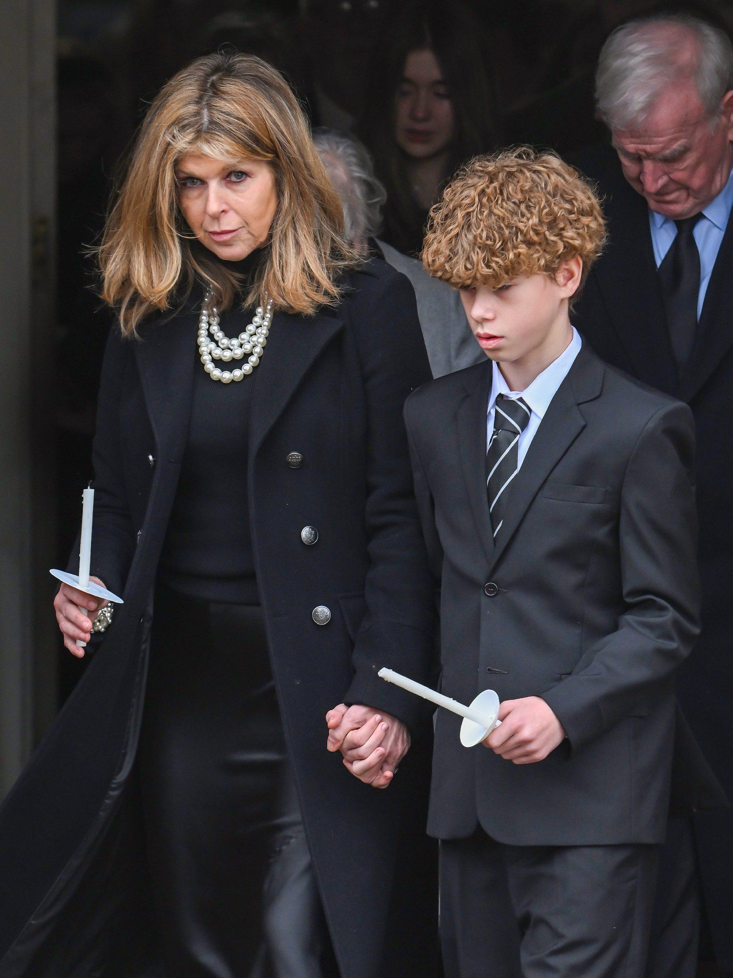 Kate Garraway and son Billy at her husband Derek Draper's funeral