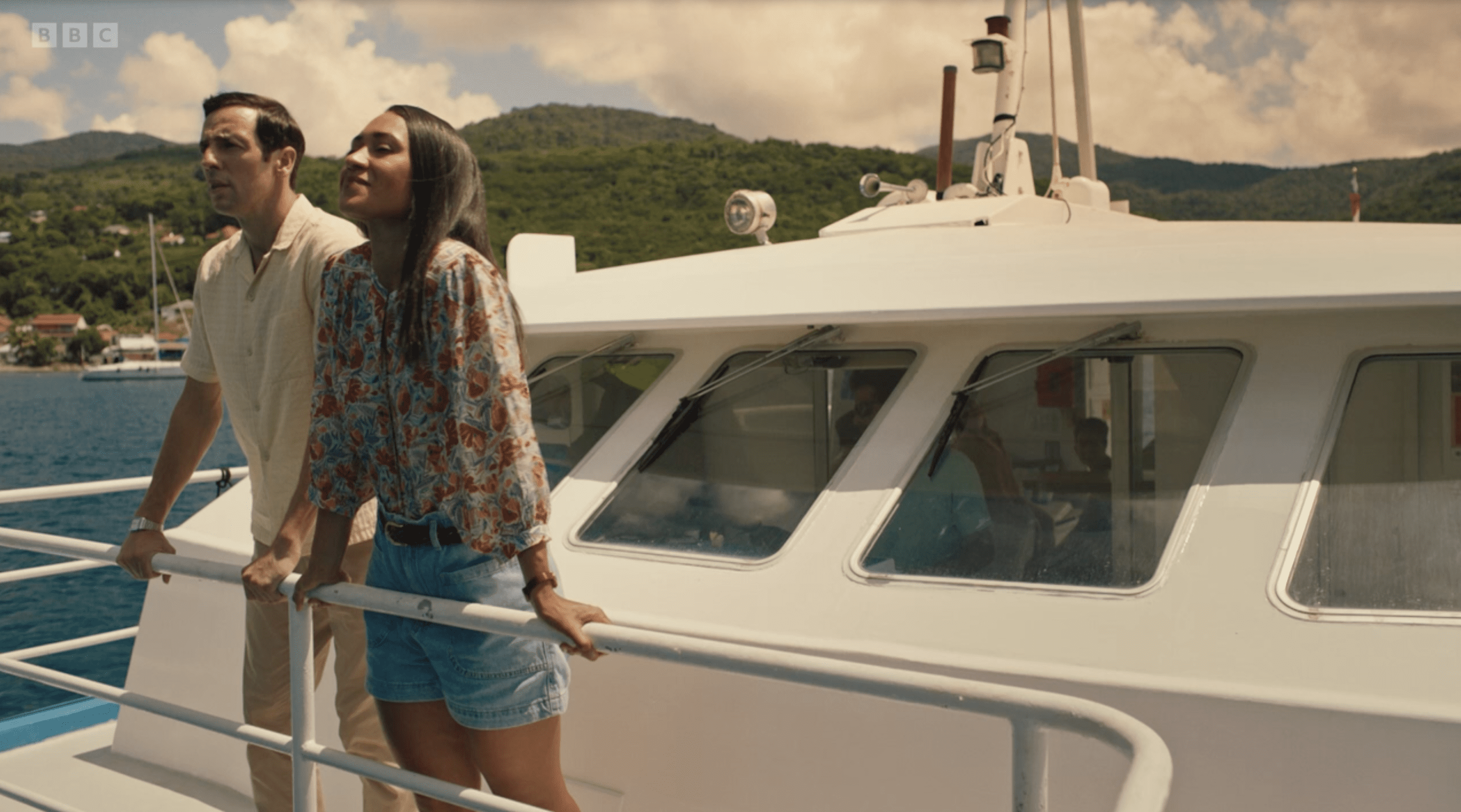 Neville and Florence on a boat in Death in Paradise