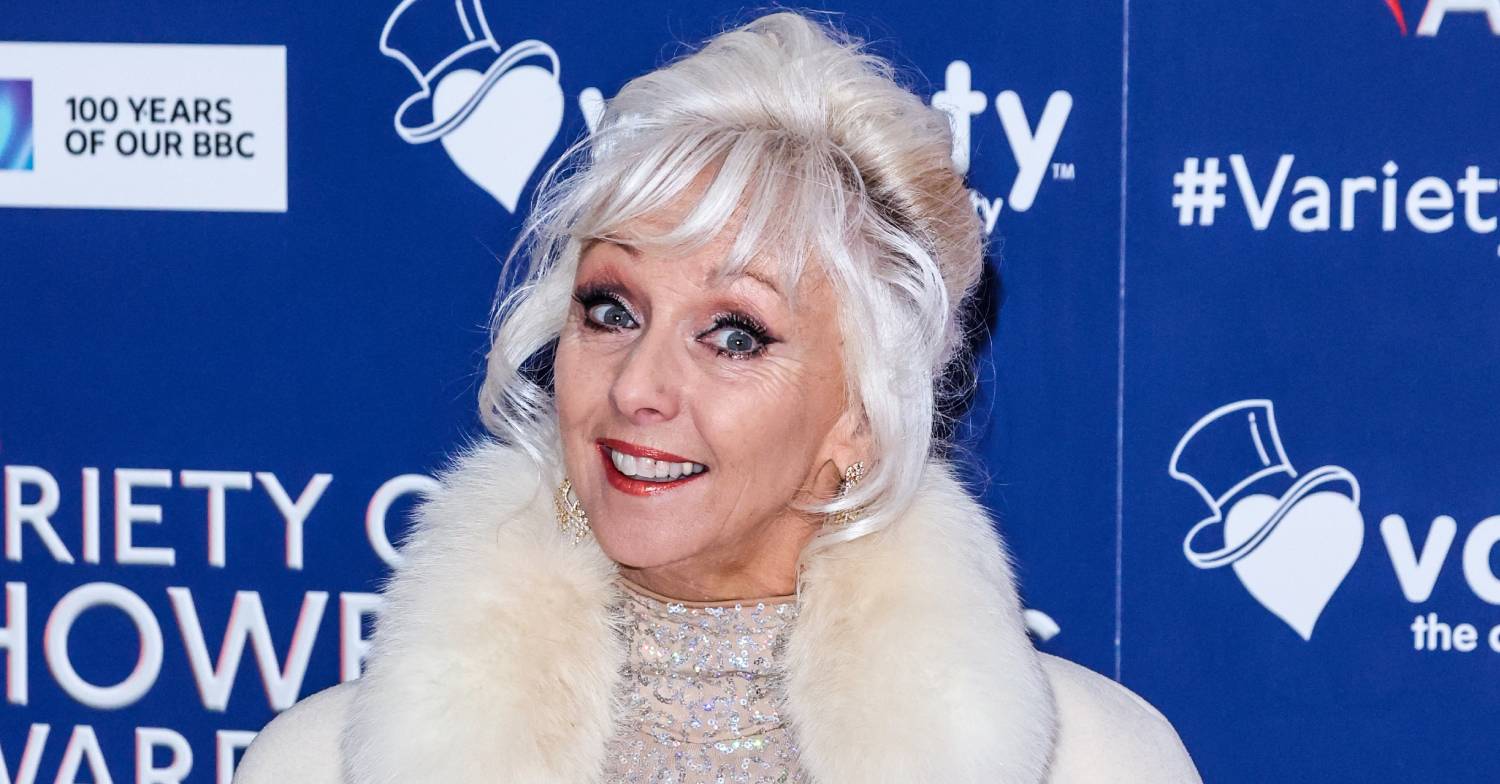 Debbie McGee smiles for the camera