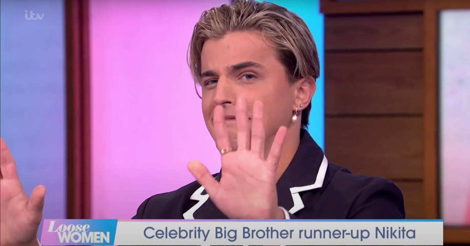 Nikita Kuzmin holds his hands up on Loose Women today