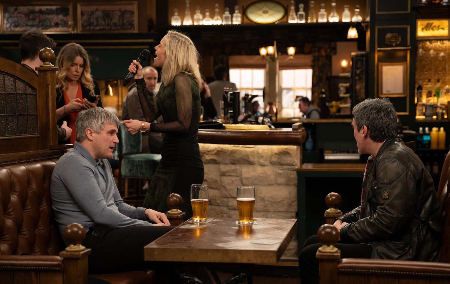 Emmerdale's Ruby is singing karaoke in the Woolpack with the Dingles