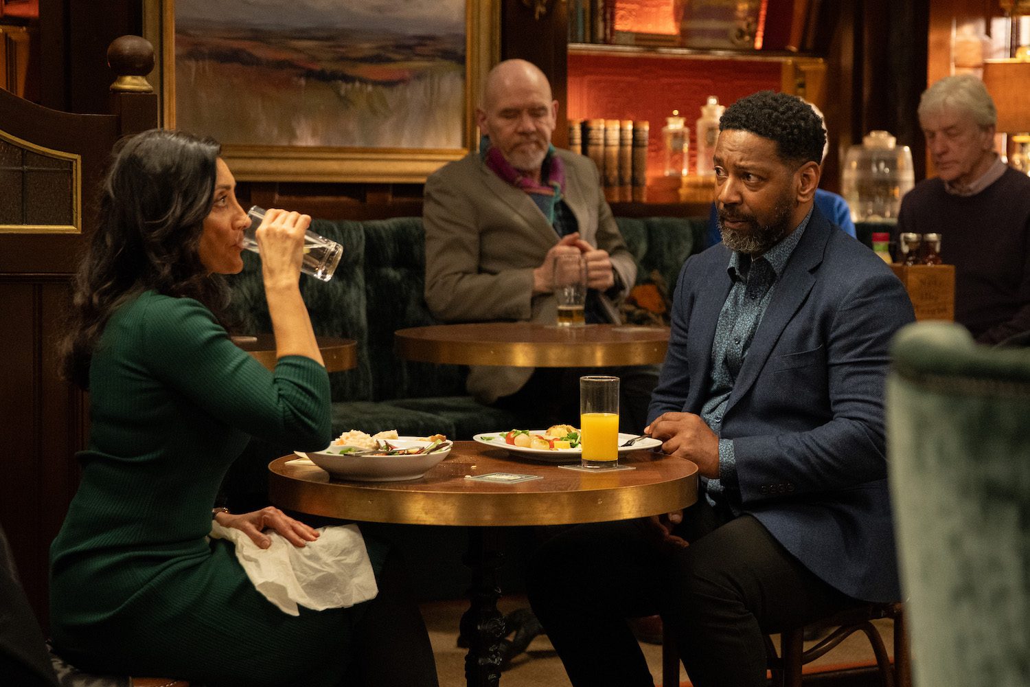 Manpreet and Charles are having a drink in the Woolpack together