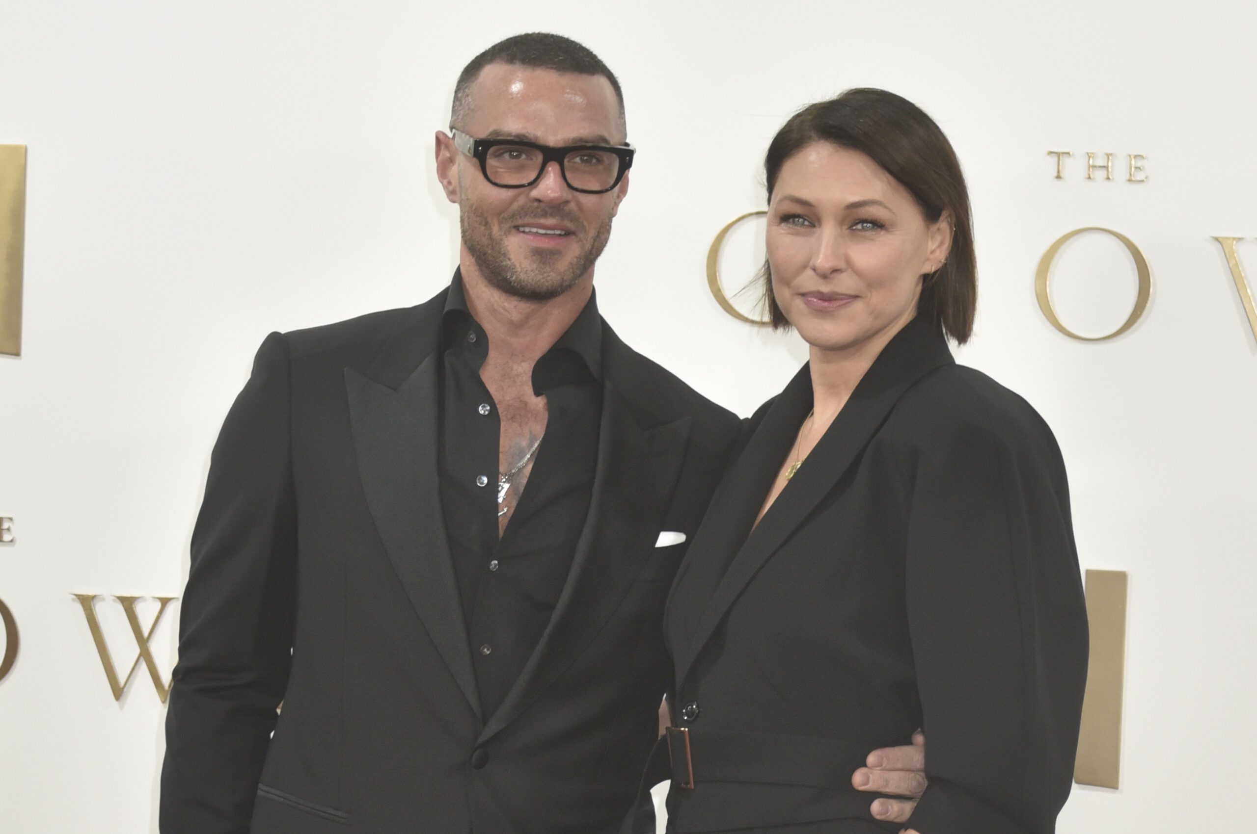 Matt Willis and wife Emma on the red carpet in black suits