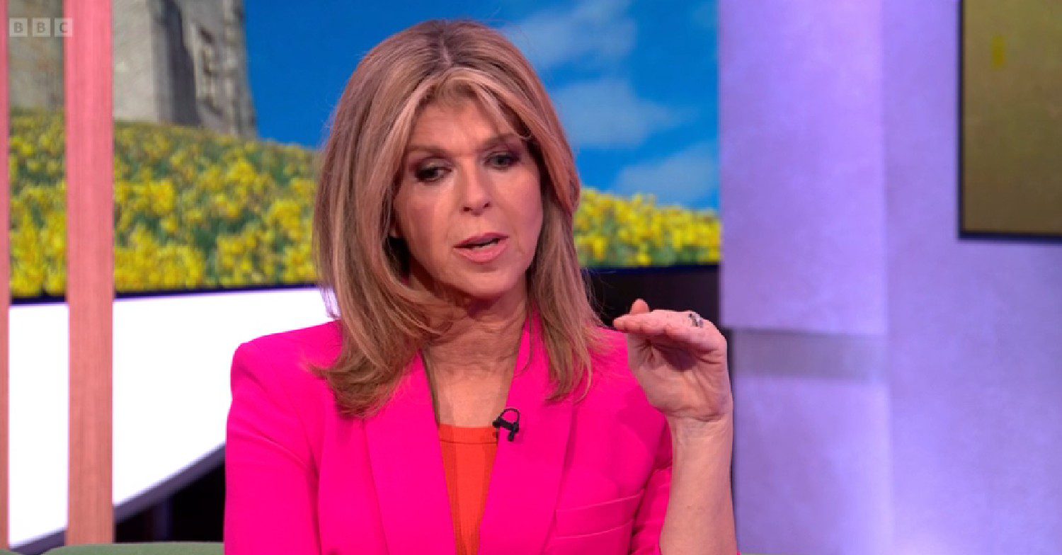 Kate Garraway speaking in pink outfit on The One Show