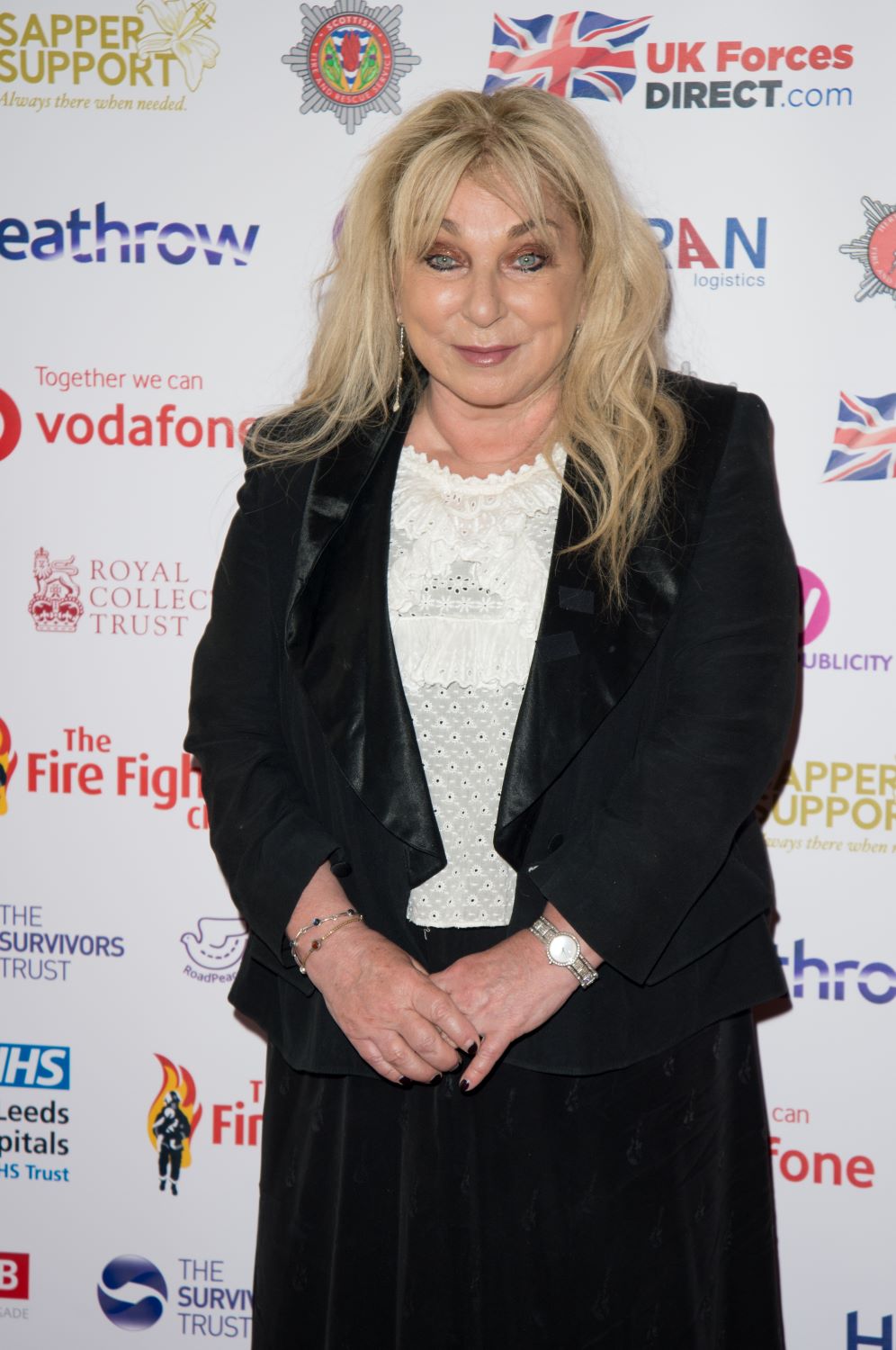 Helen Lederer smiles nervously on the red carpet