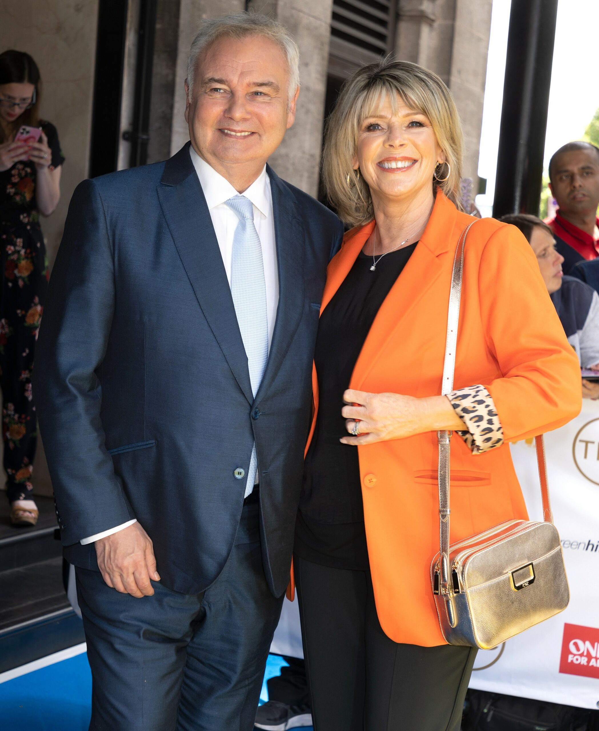 Eamonn Holmes smiling with Ruth Langsford at TRIC Awards