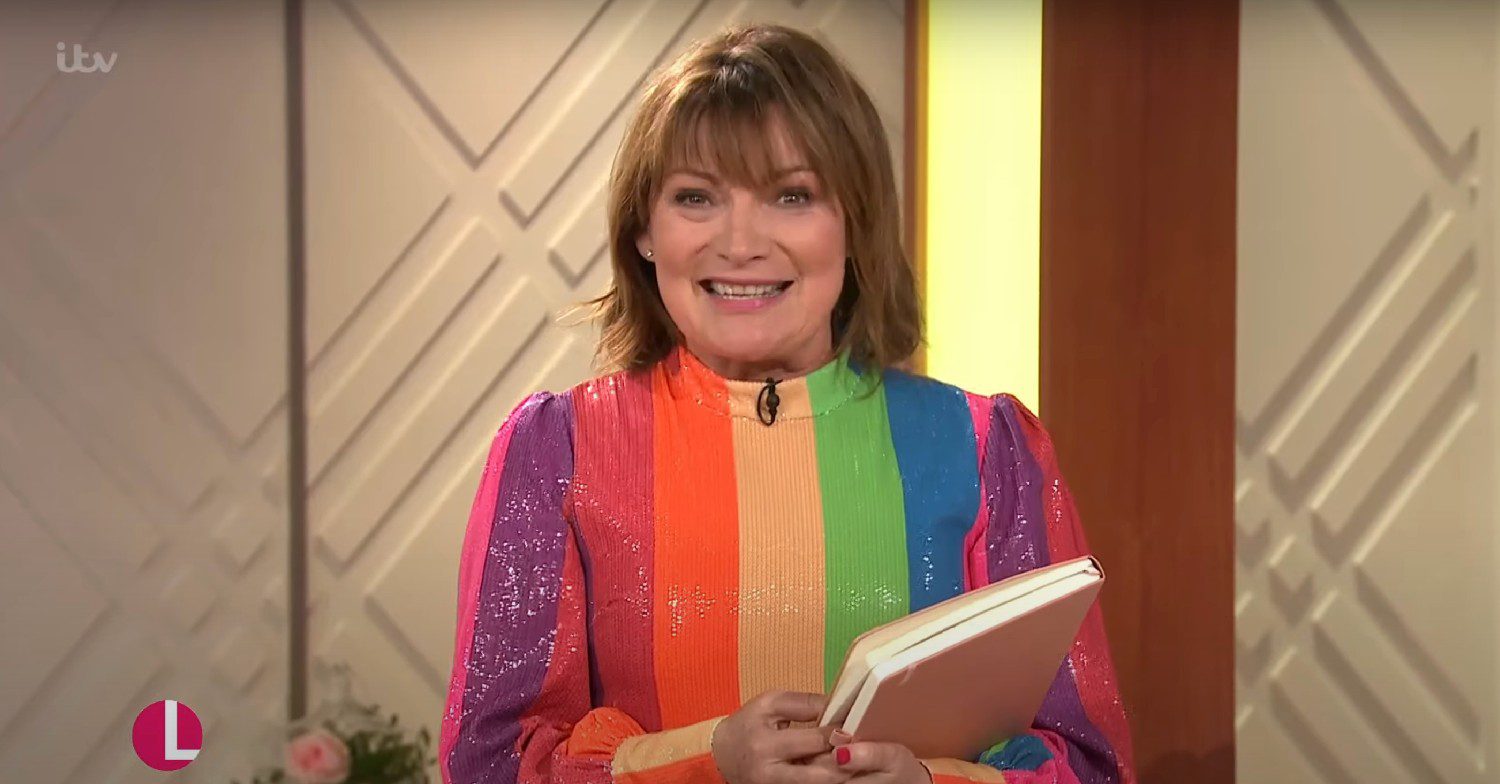 lorraine Kelly smiling in a rainbow dress 