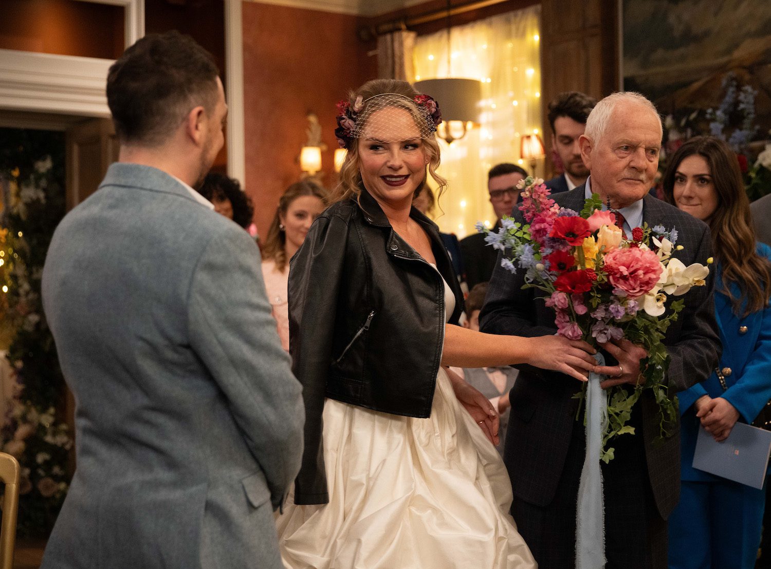 Eric Pollard walks Amy Wyatt down the aisle