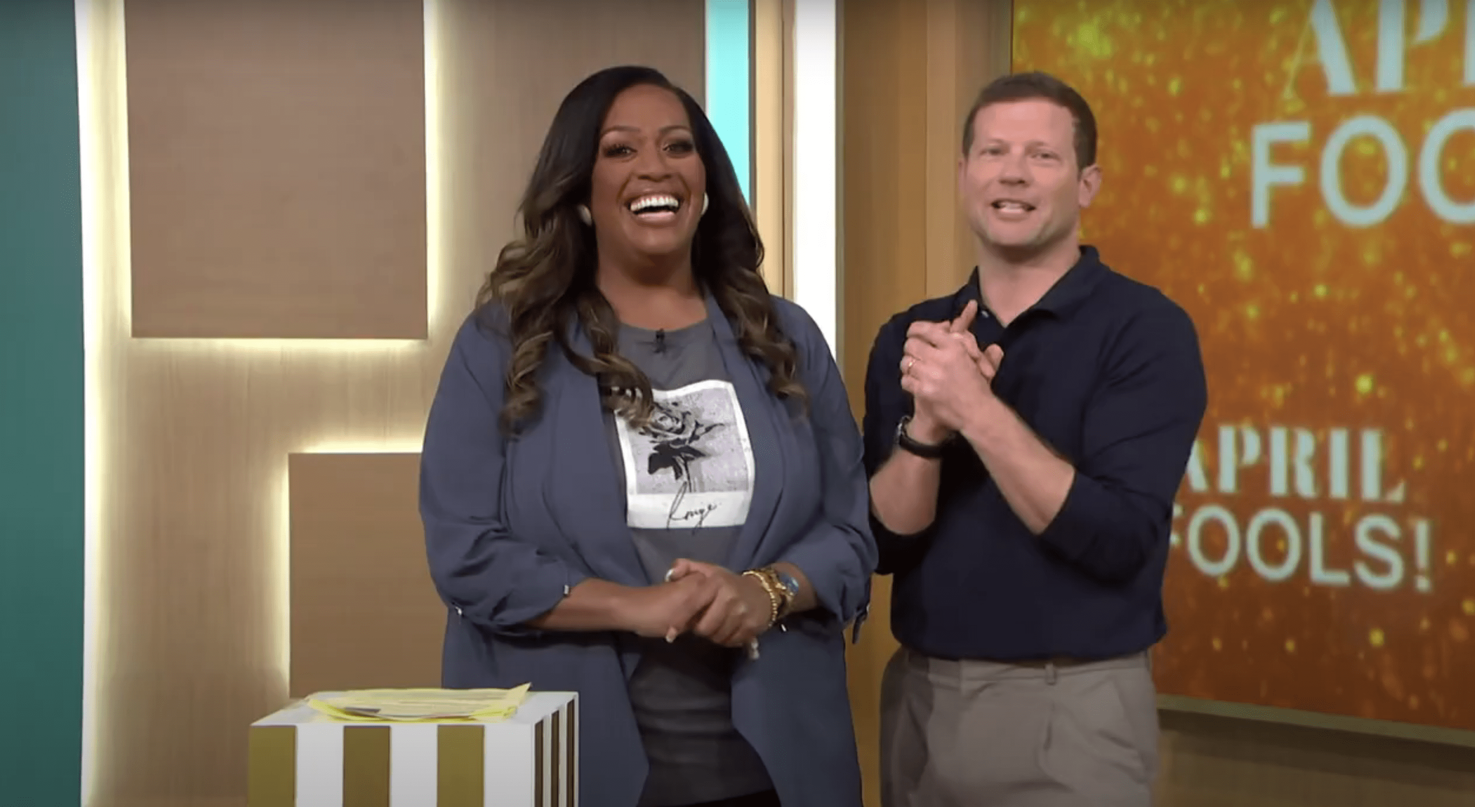 Alison Hammond grinning whilst presenting This Morning with Dermot O'Leary 