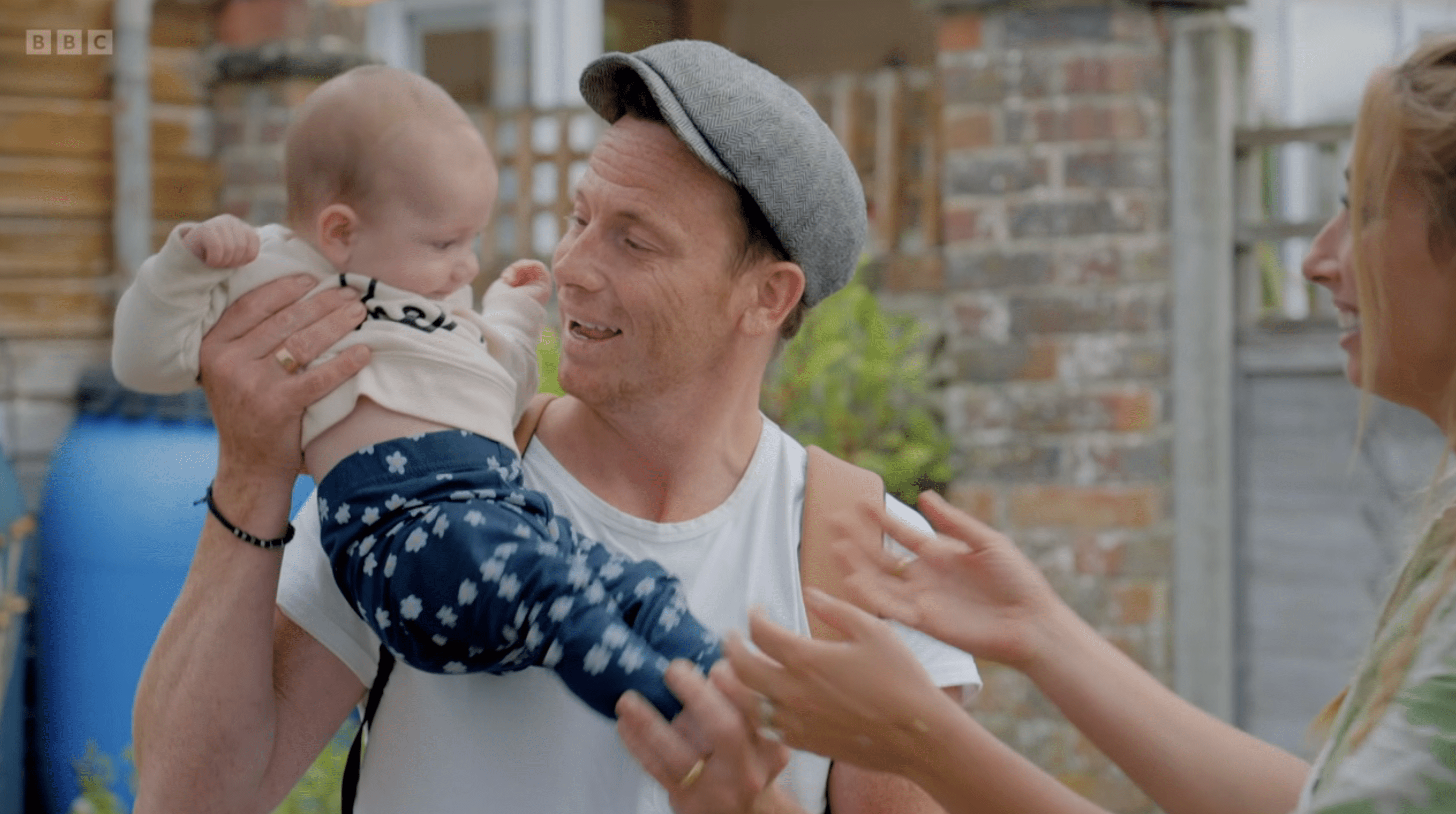 Joe Swash with baby Belle as he visited Stacey Solomon on the Sort Your Life Out set
