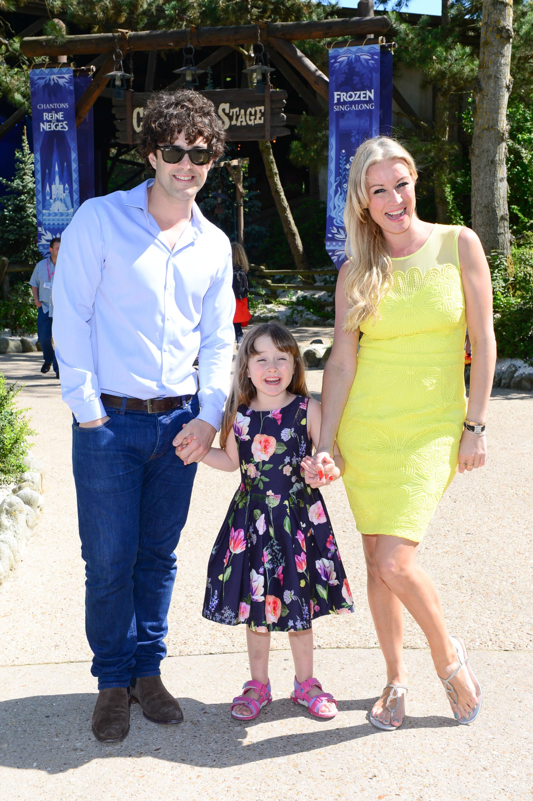 Denise Van Outen, Lee Mead and their daughter Betsy smiling