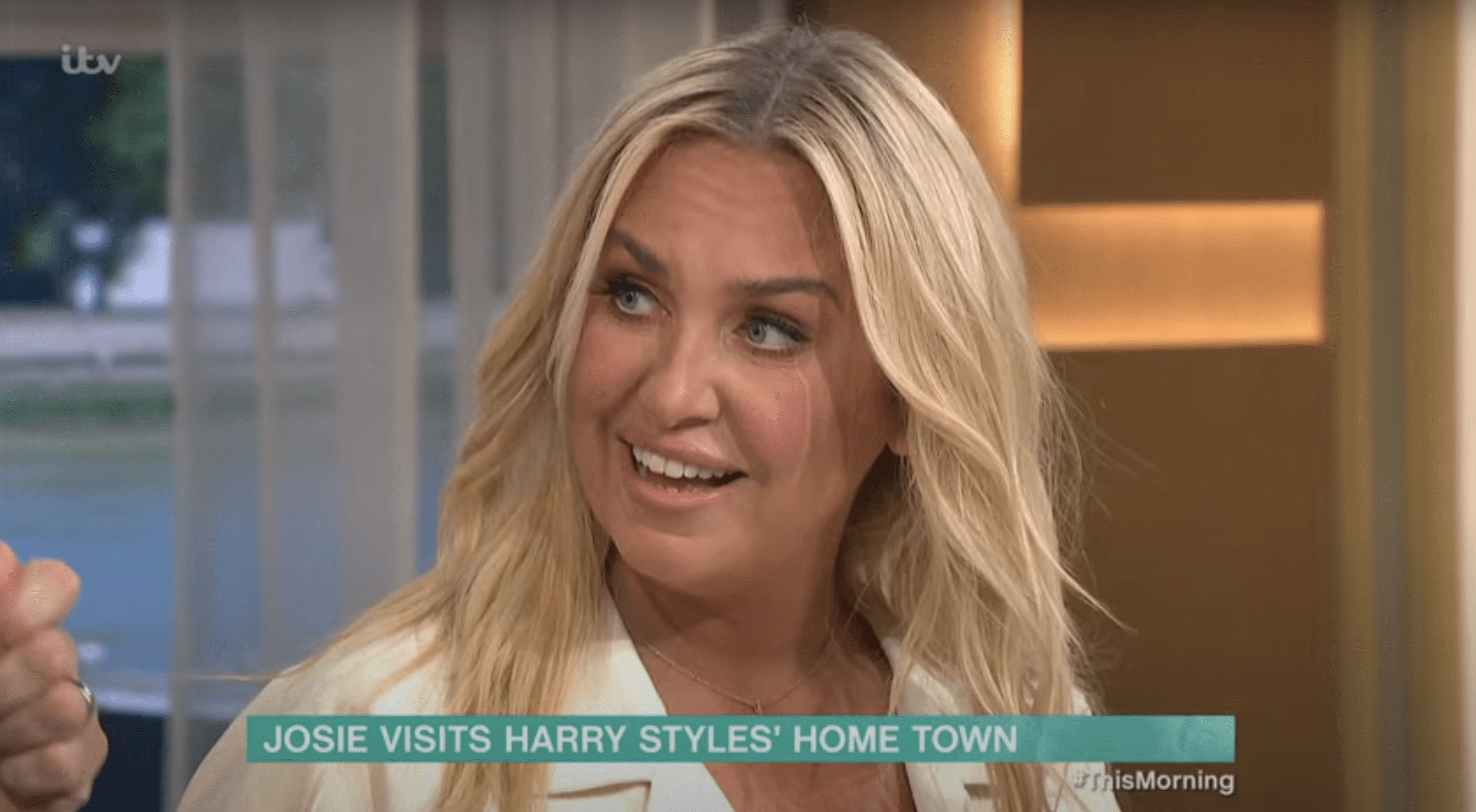 Josie Gibson on This Morning presenting whilst smiling
