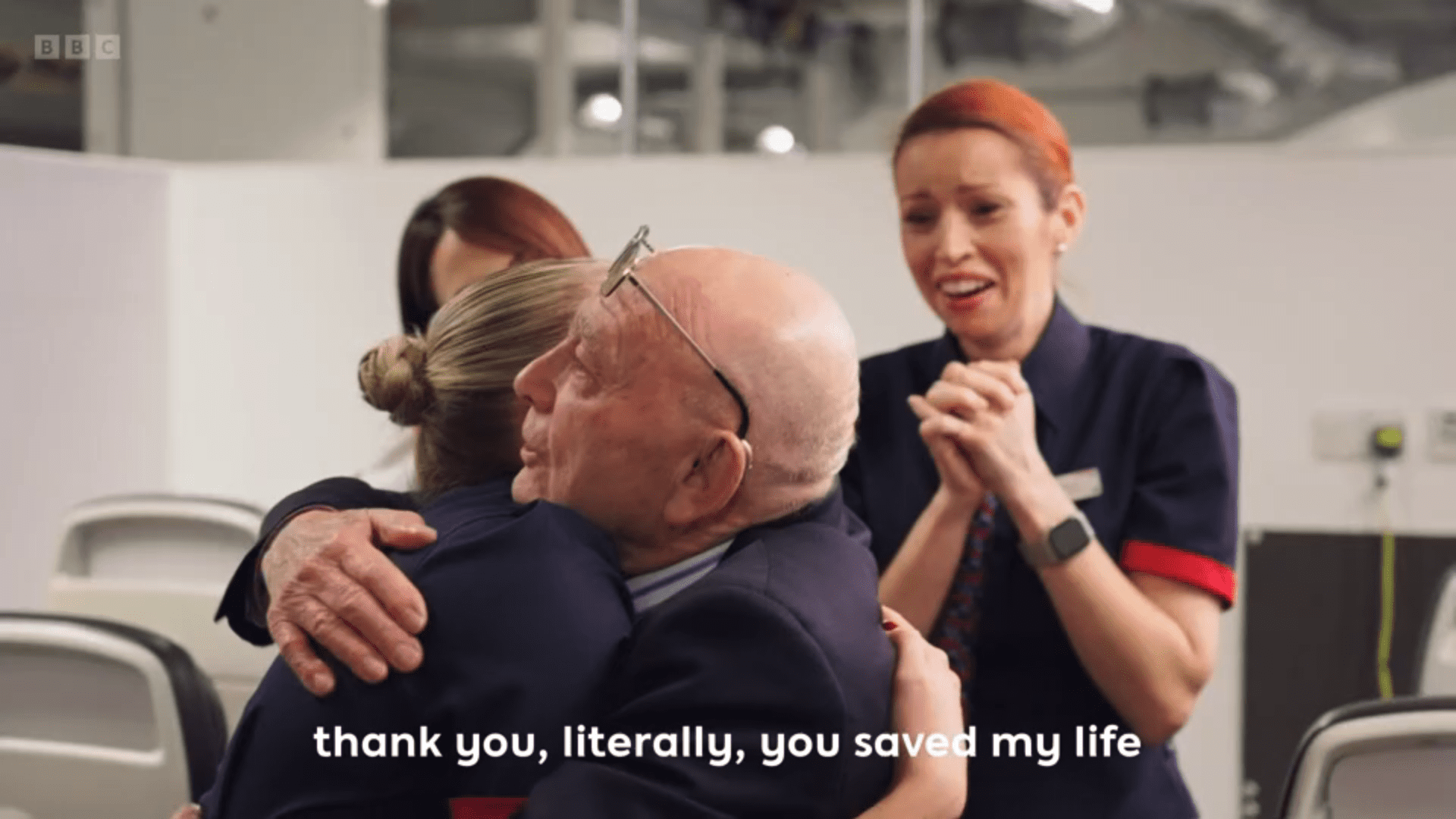 A man hugging an air stewardess