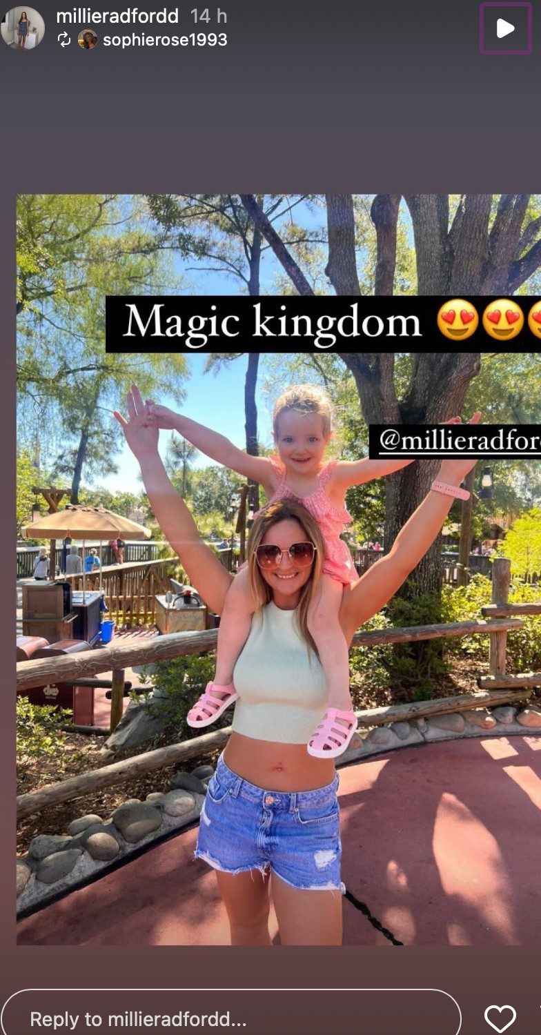 22 Kids & Counting star Millie Radford in Disneyland on holiday holding daughter