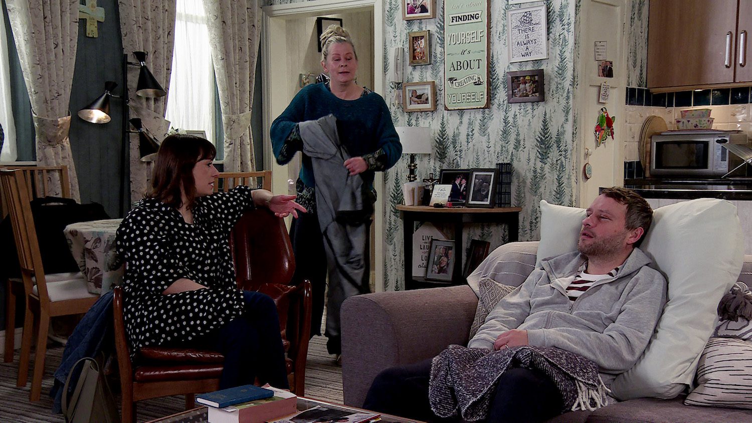 Bernie in Coronation Street smiles as she sees Hannah and Paul interacting