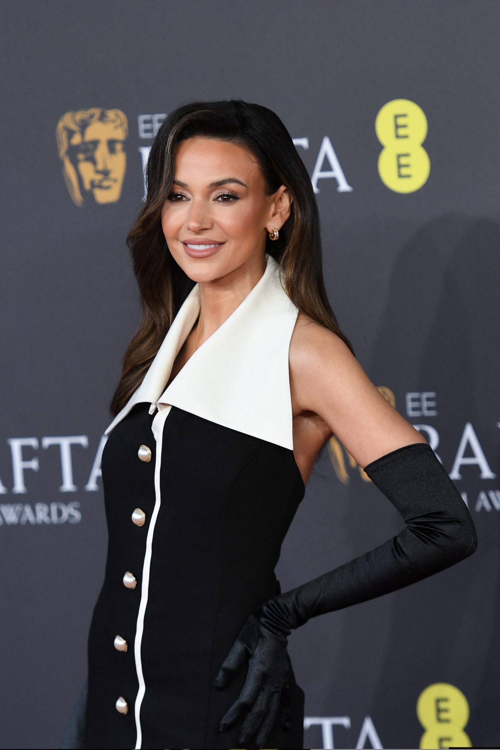 Michelle Keegan could be the next Bond girl, Michelle wearing black and white dress on Baftas red carpet
