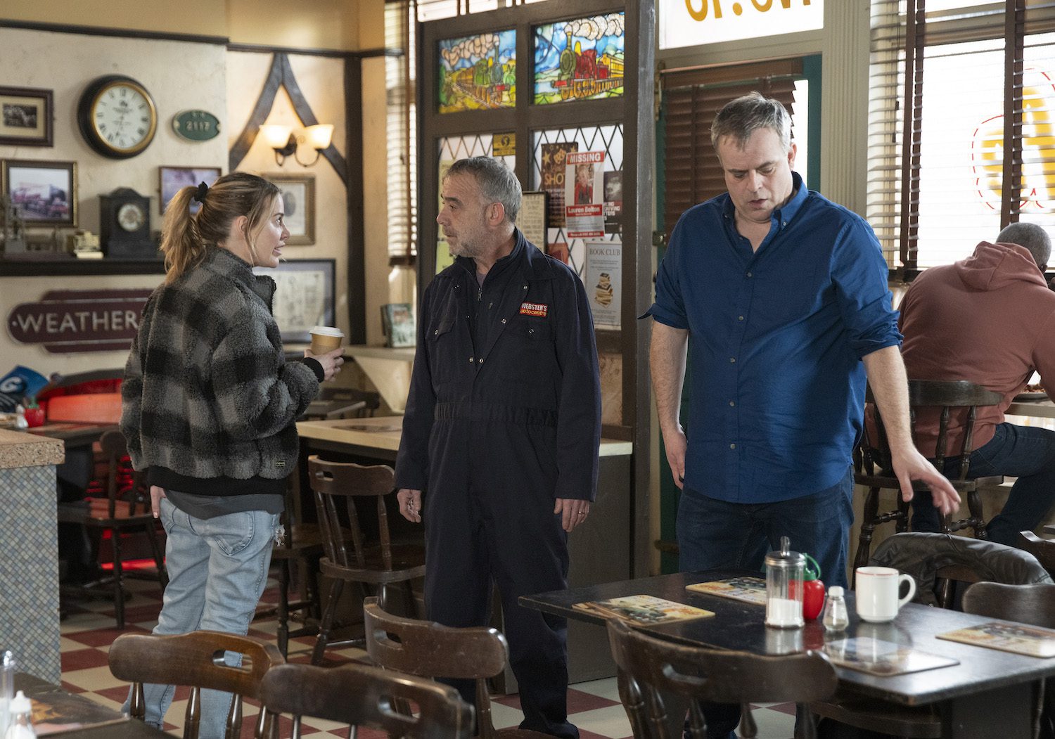 Abi looks unimpressed as Kevin paws over Steve's dating app pics in Corrie