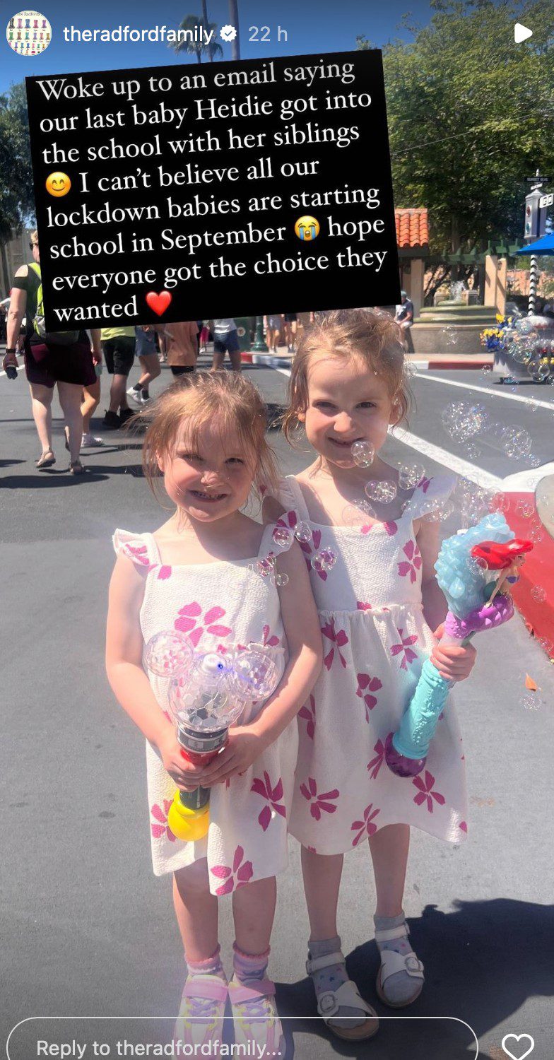 The Radford family, Heidie and Bonnie at Disneyland, smiling in matching dresses