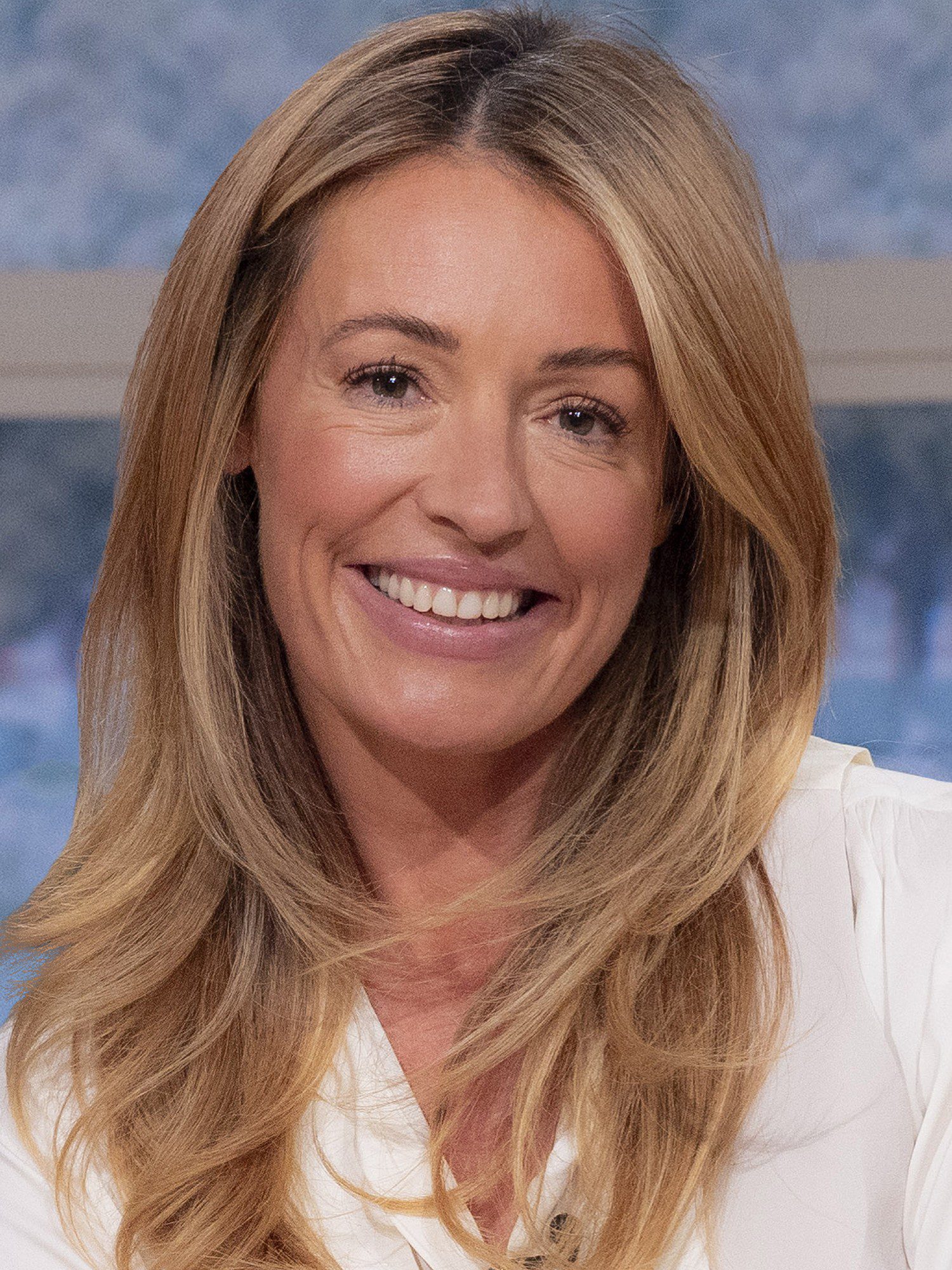 Cat Deeley smiling in This Morning promo picture