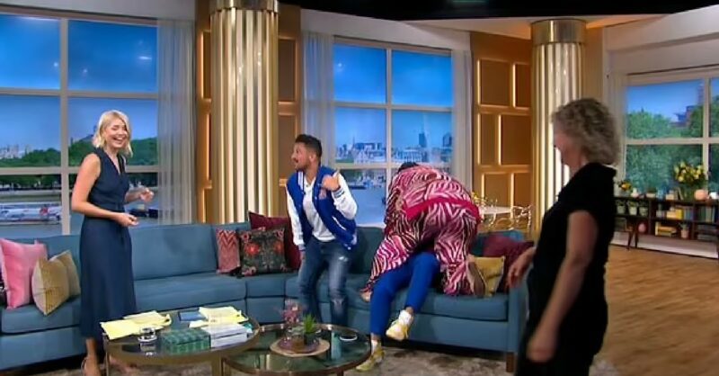 Alison Hammond on This Morning with Holly while mounting Jason