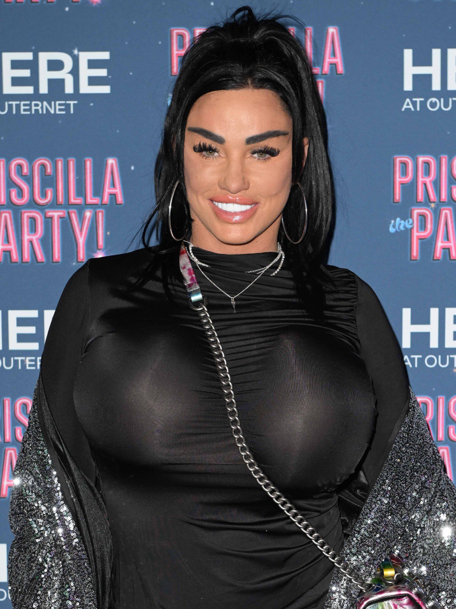 Katie Price smiling at event