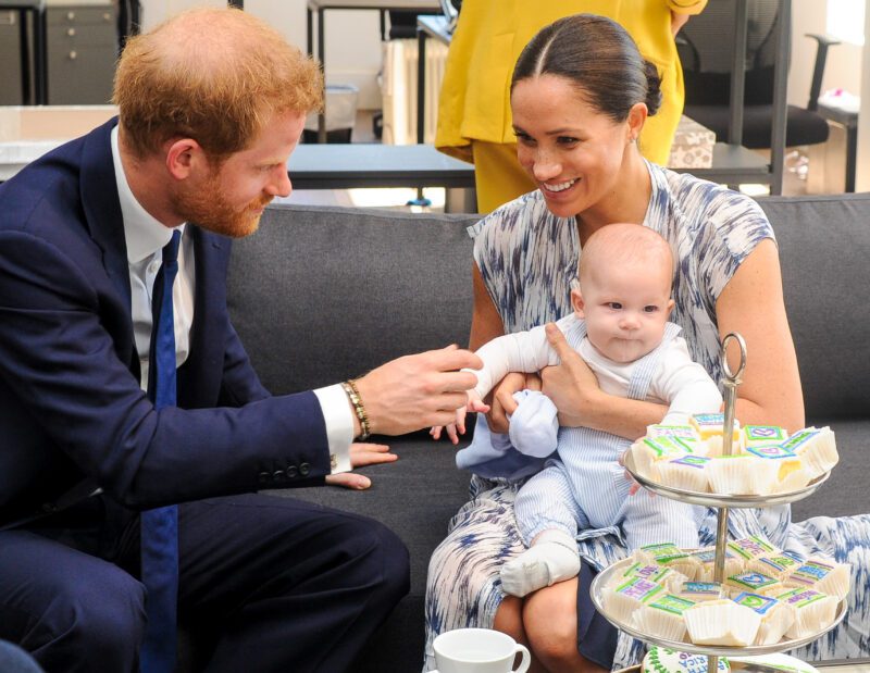 Prince harry and Meghan Markle with their baby
