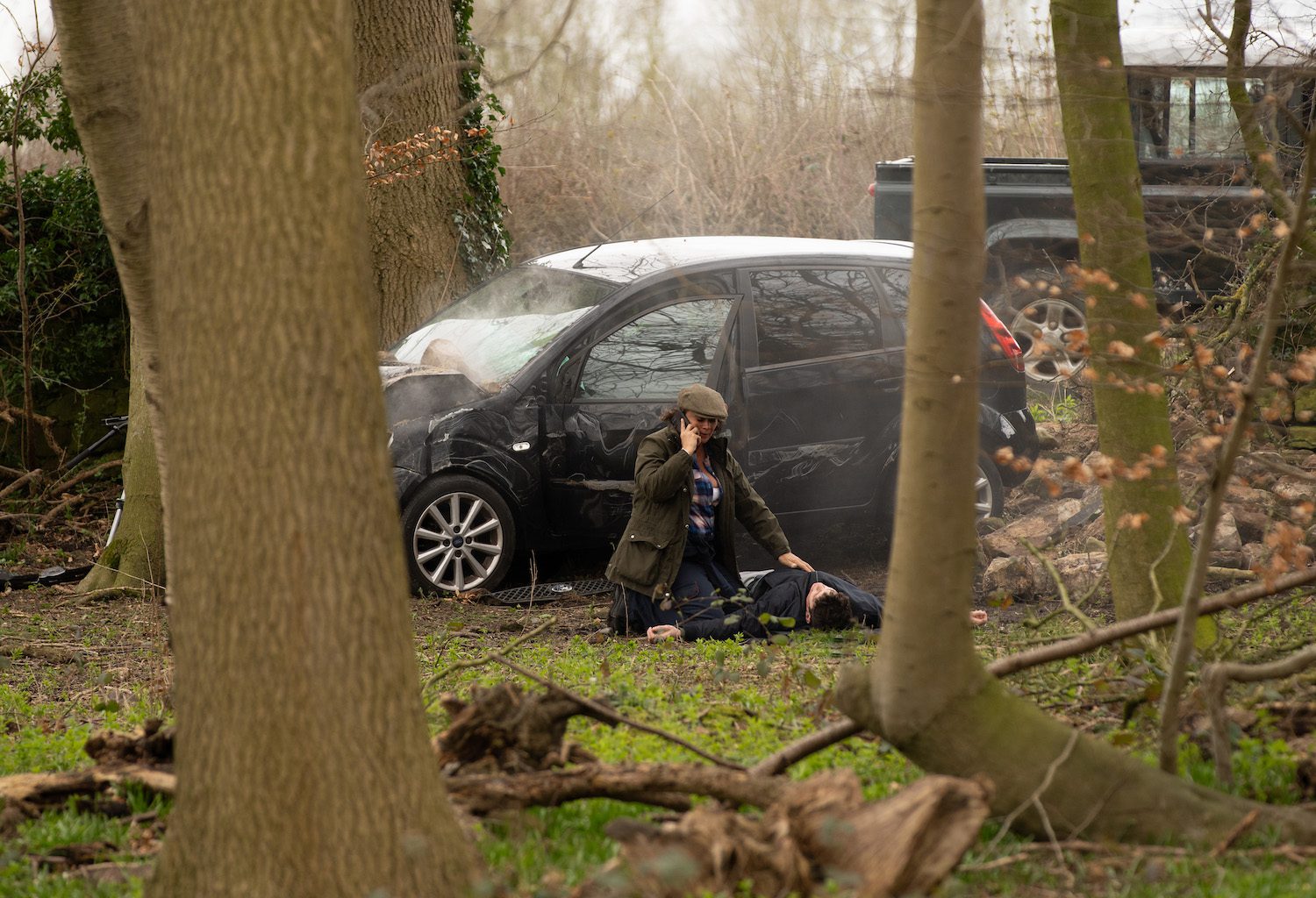 Moira Dingle finds unconscious Nicky next to the crashed car and calls an ambulance