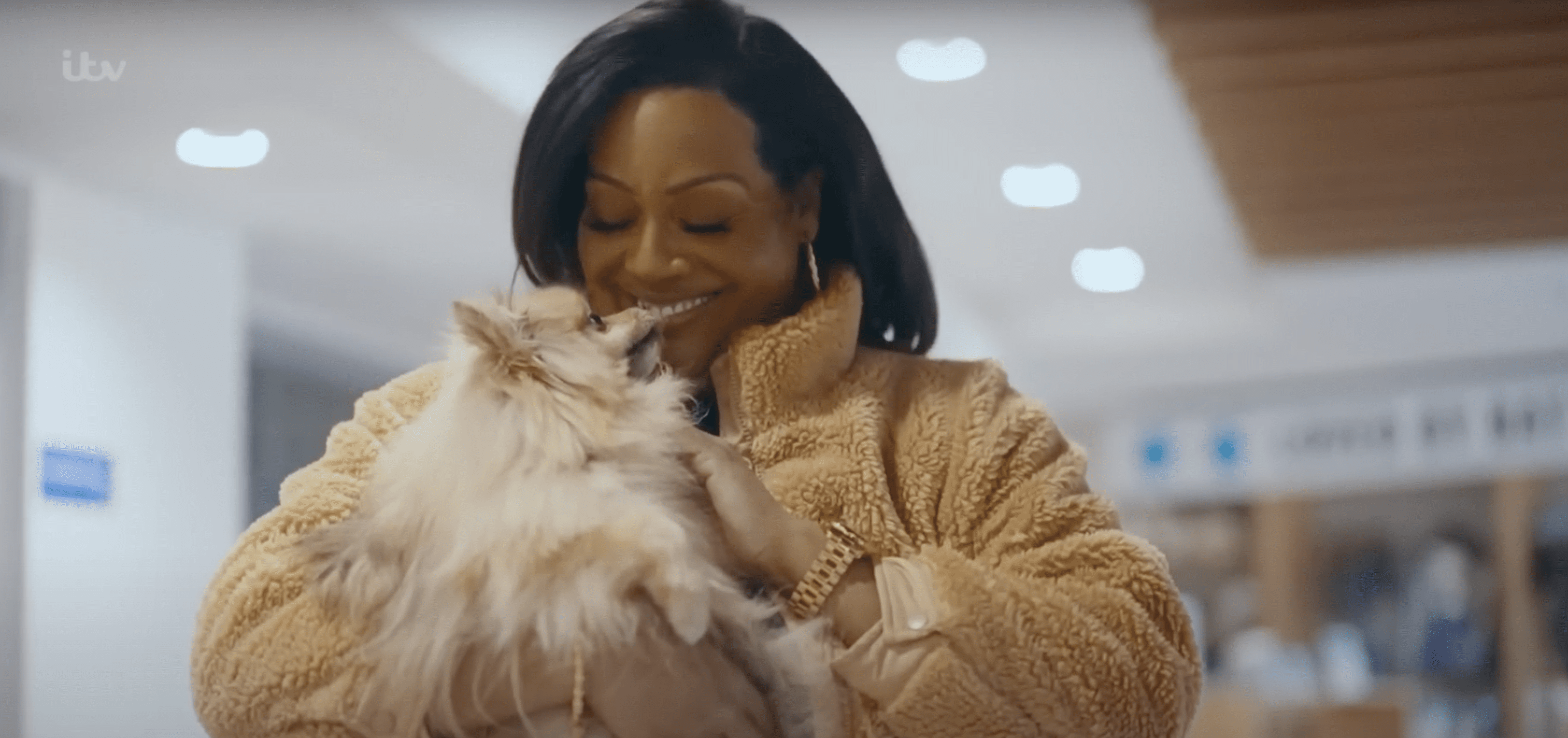 Alison Hammond cuddling dog on For the Love of Dogs