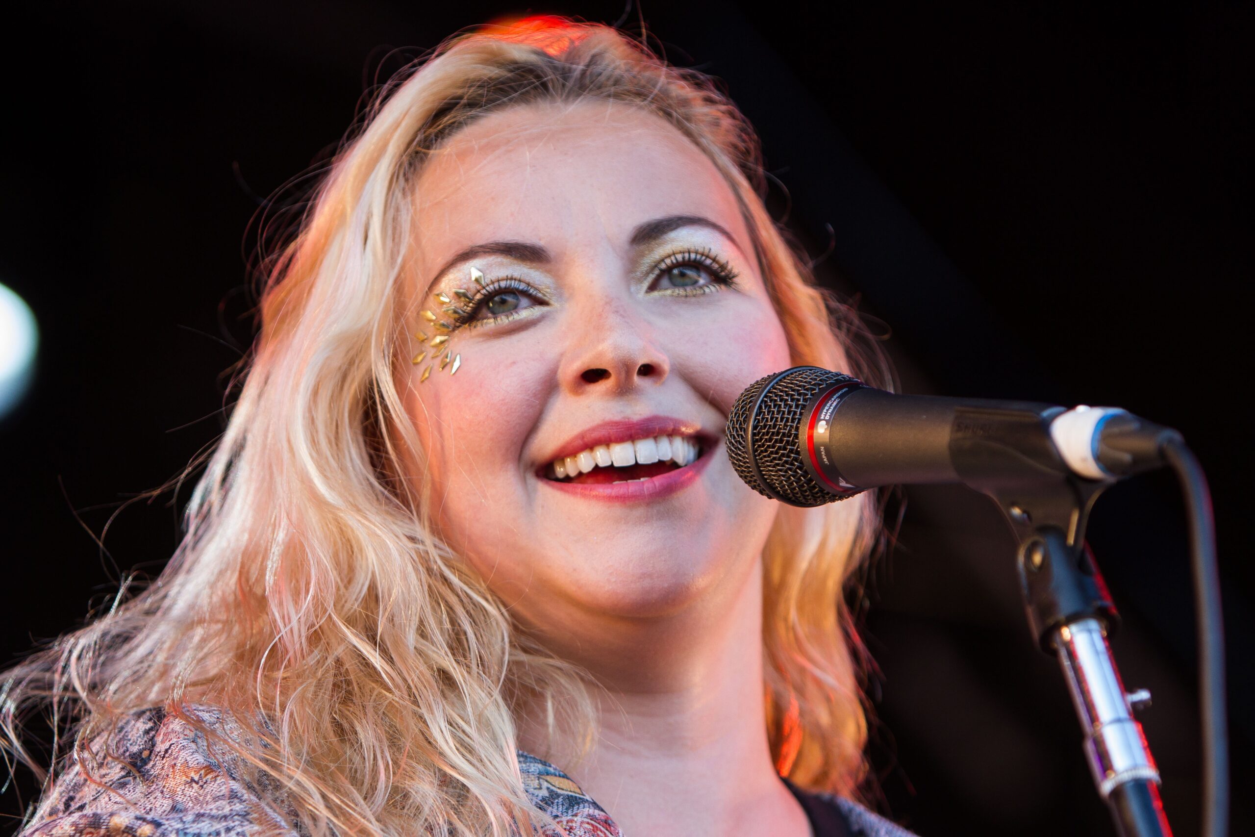 Charlotte Church singing into a microphone