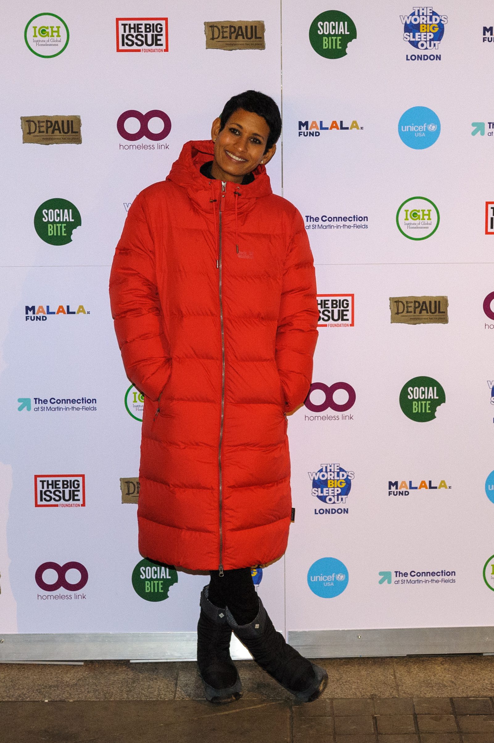 Naga Munchetty in a big red coat 