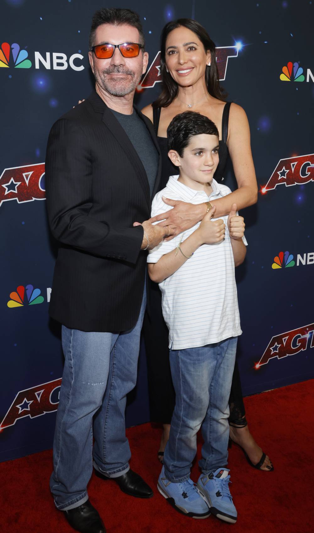 Simon Cowell poses for pics with Lauren Silverman and son Eric Cowell