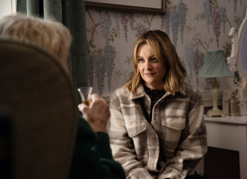 Ella smiles weakly as she visits a care home in Emmerdale