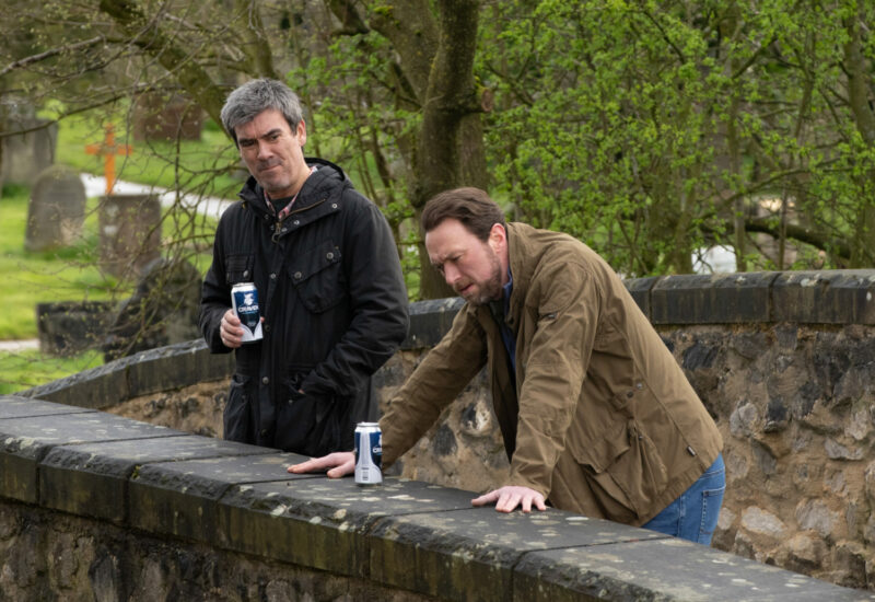 Cain Dingle and Liam Cavanagh have a can of beer at the bridge and Cain looks worried about stressed Liam