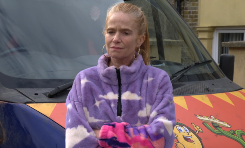 Bianca in EastEnders looks sad as she folds her arms