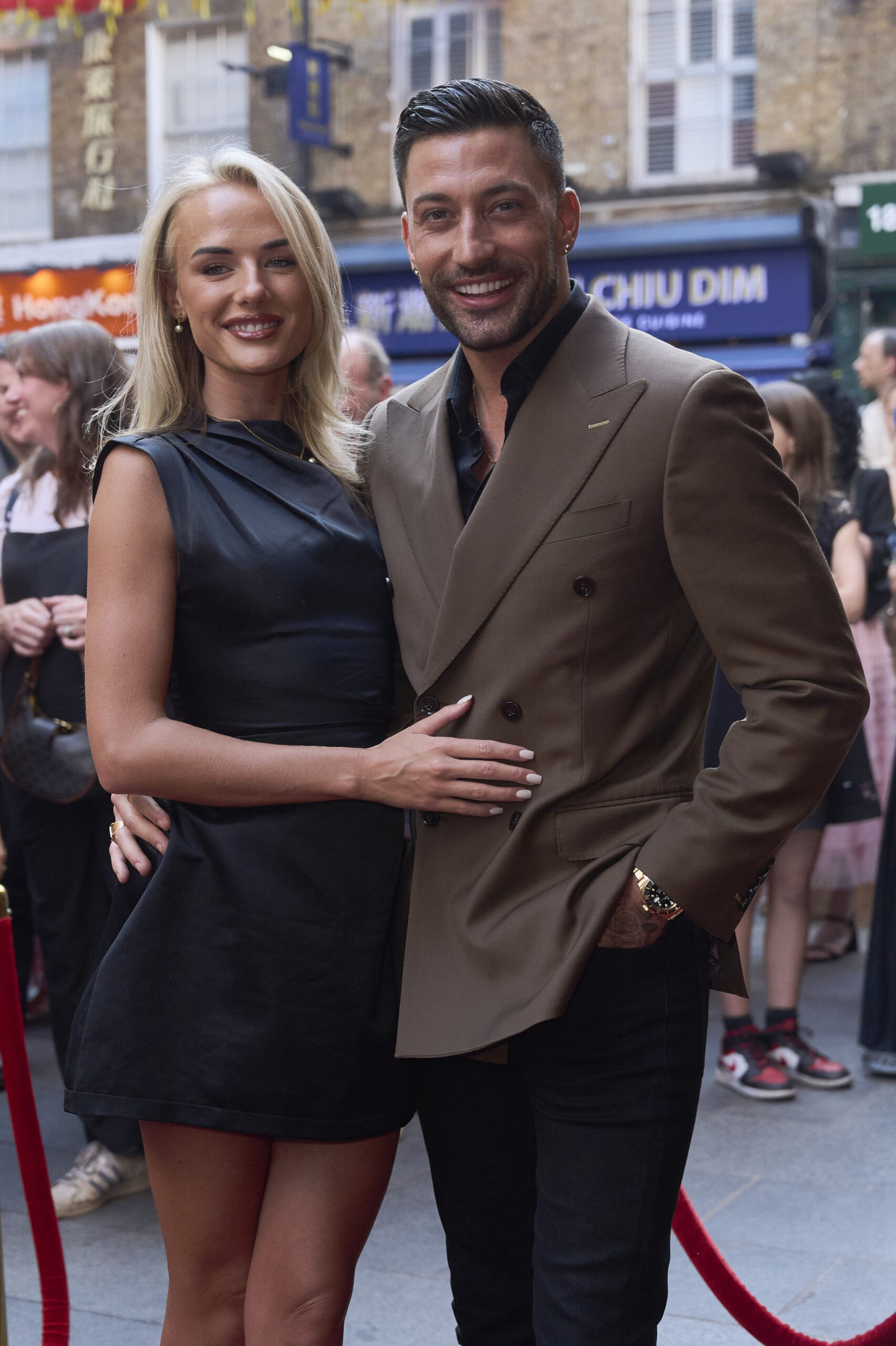 Giovanni Pernice and Molly Brown posing on the red carpet
