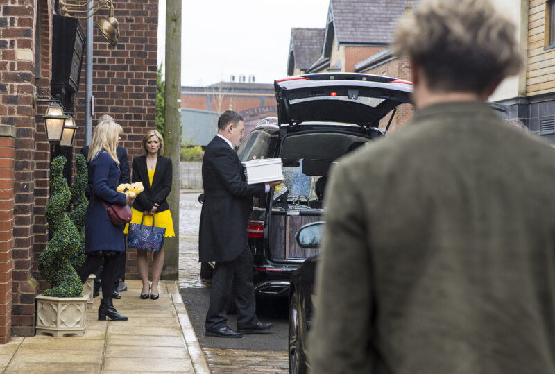 Coronation Street: George carries baby Rose's coffin to the hearse as Toyah follows behind and Leanne looks sombre