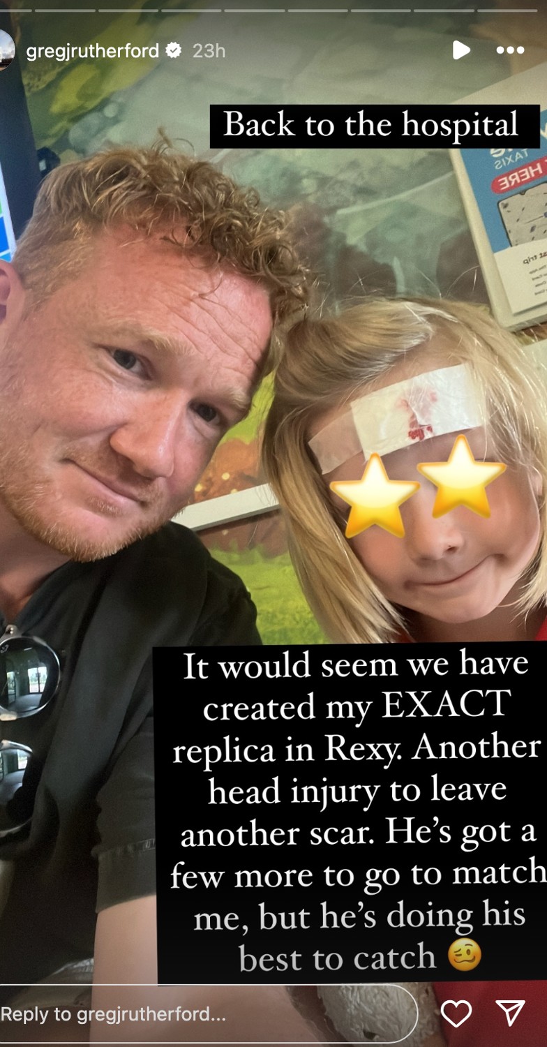 Greg Rutherford frowning beside son Rex with a bandage on his forehead