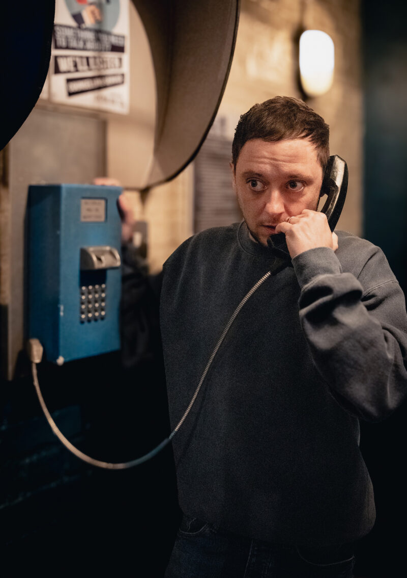 Matty Barton takes a phone call in prison in Emmerdale.