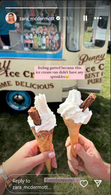 Two ice-cream cones in front of an ice-cream van