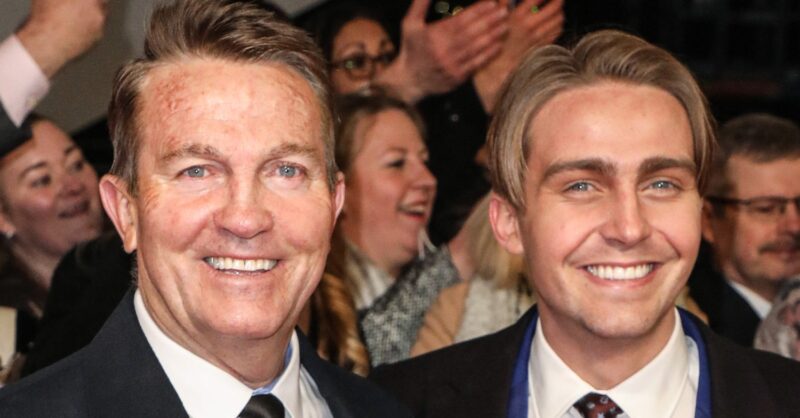 Bradley and Barney Walsh smiling on the red carpet