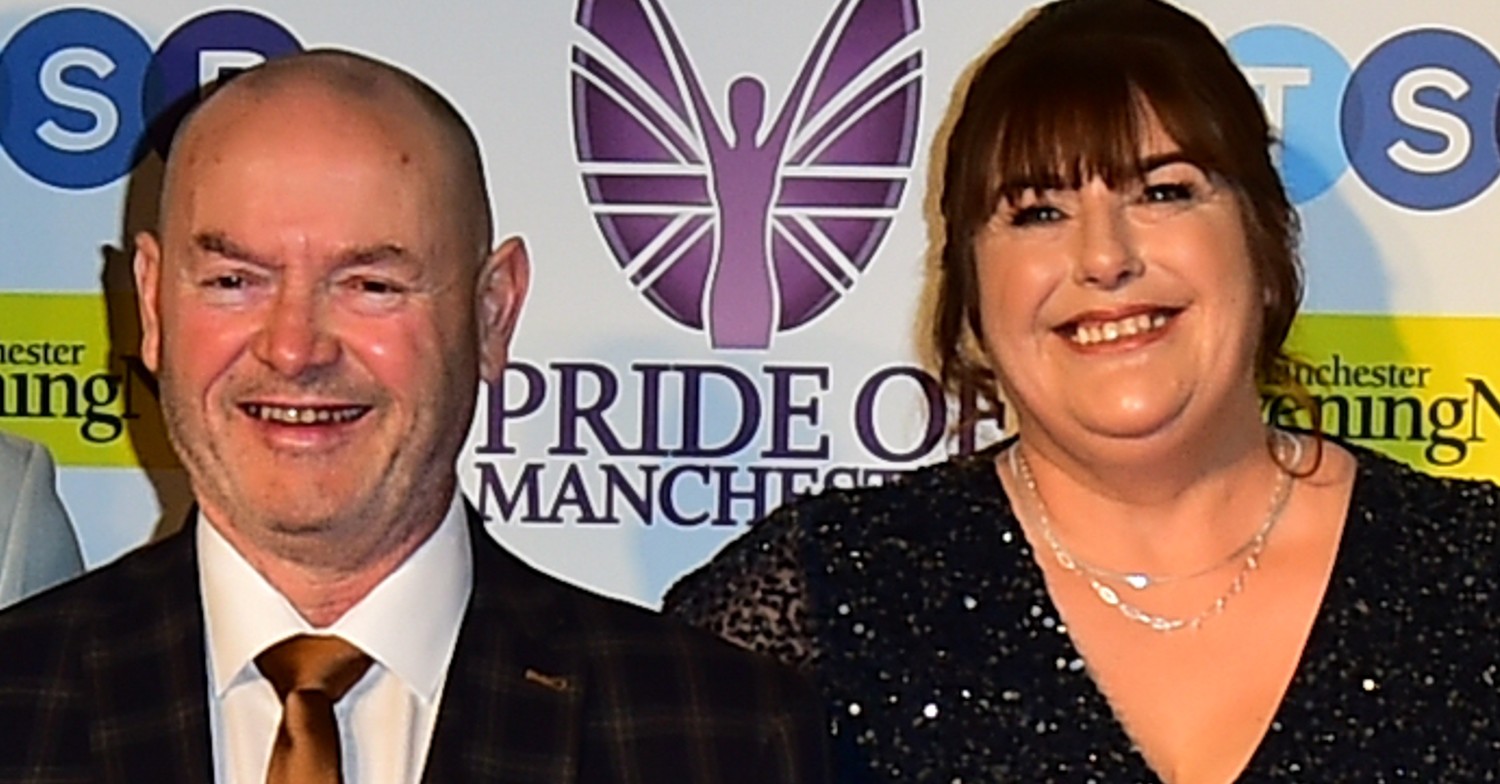 Tom and Julie Malone on the red carpet smiling