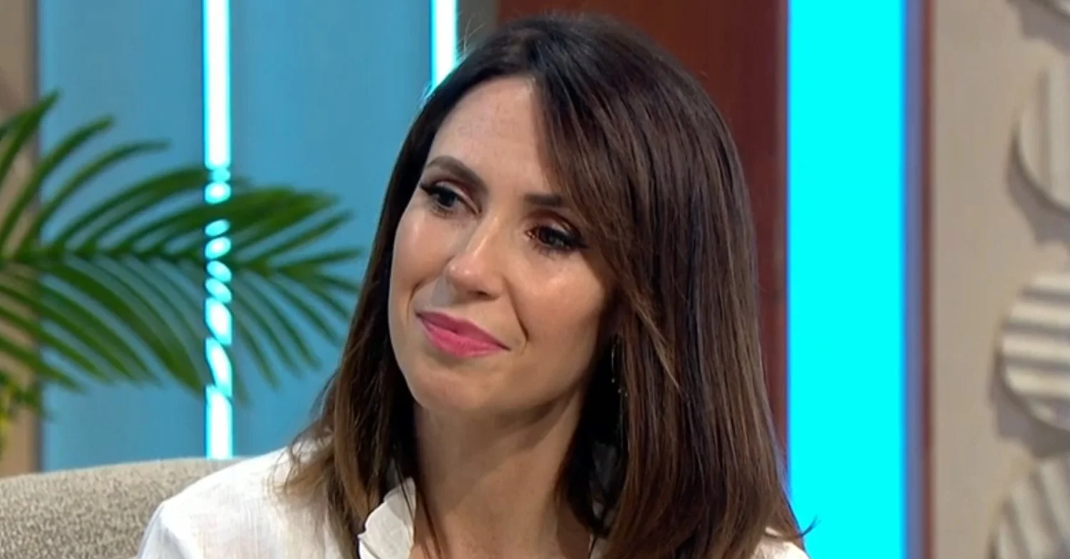 Alex Jones smiling on Lorraine