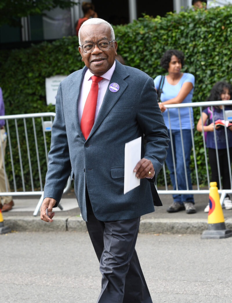 Sir Trevor McDonald in a suit