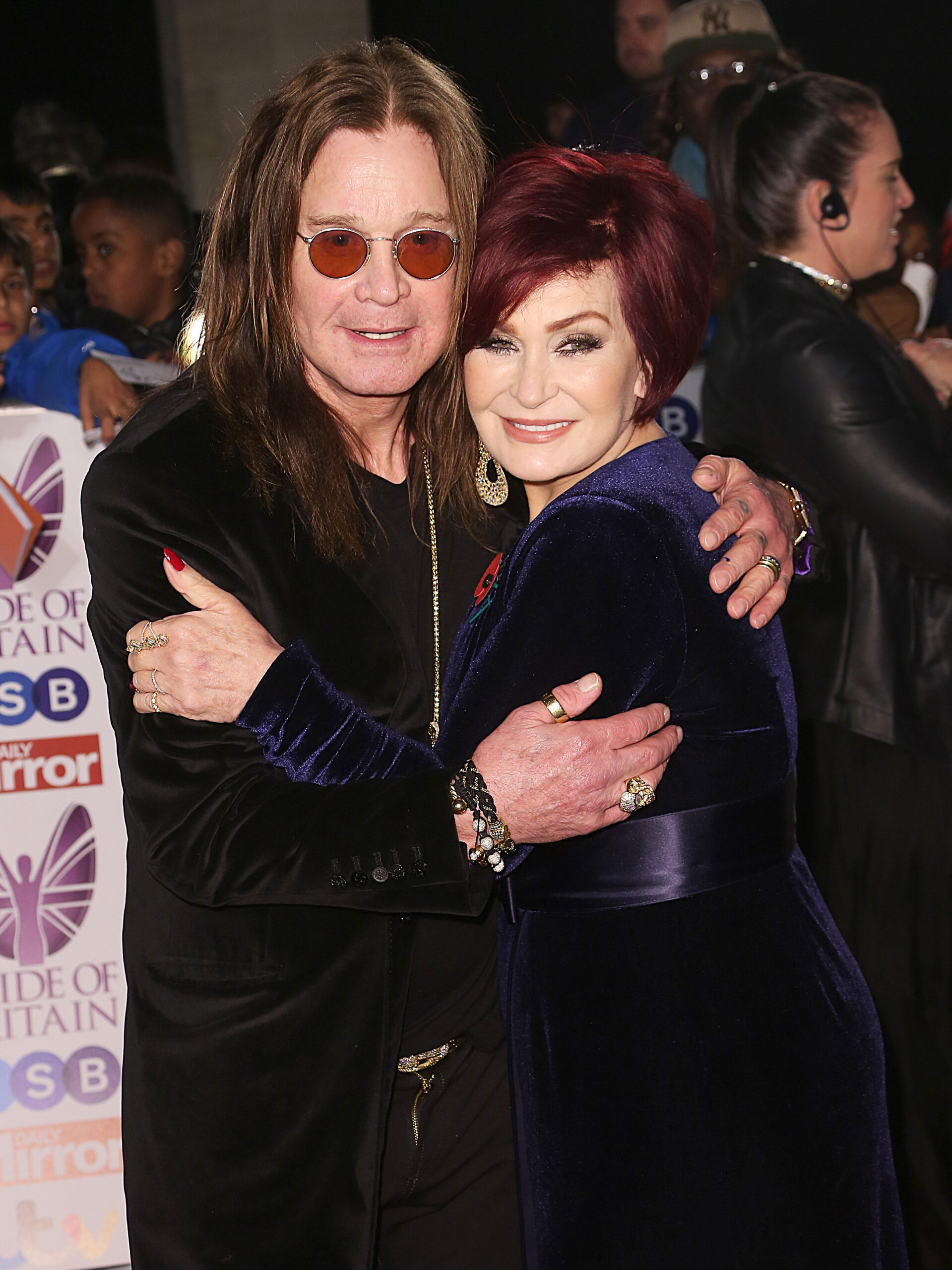 Ozzy and Sharon Osbourne hugging