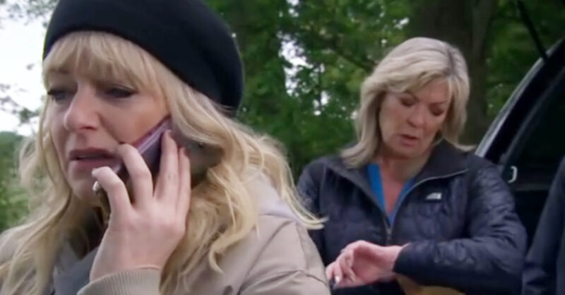 Emmerdale's Rose is wearing a black beanie whilst on the phone