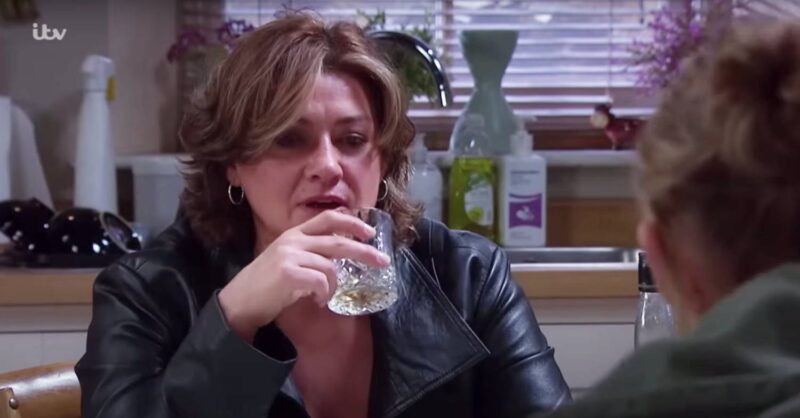 Moira takes a sip in Emmerdale