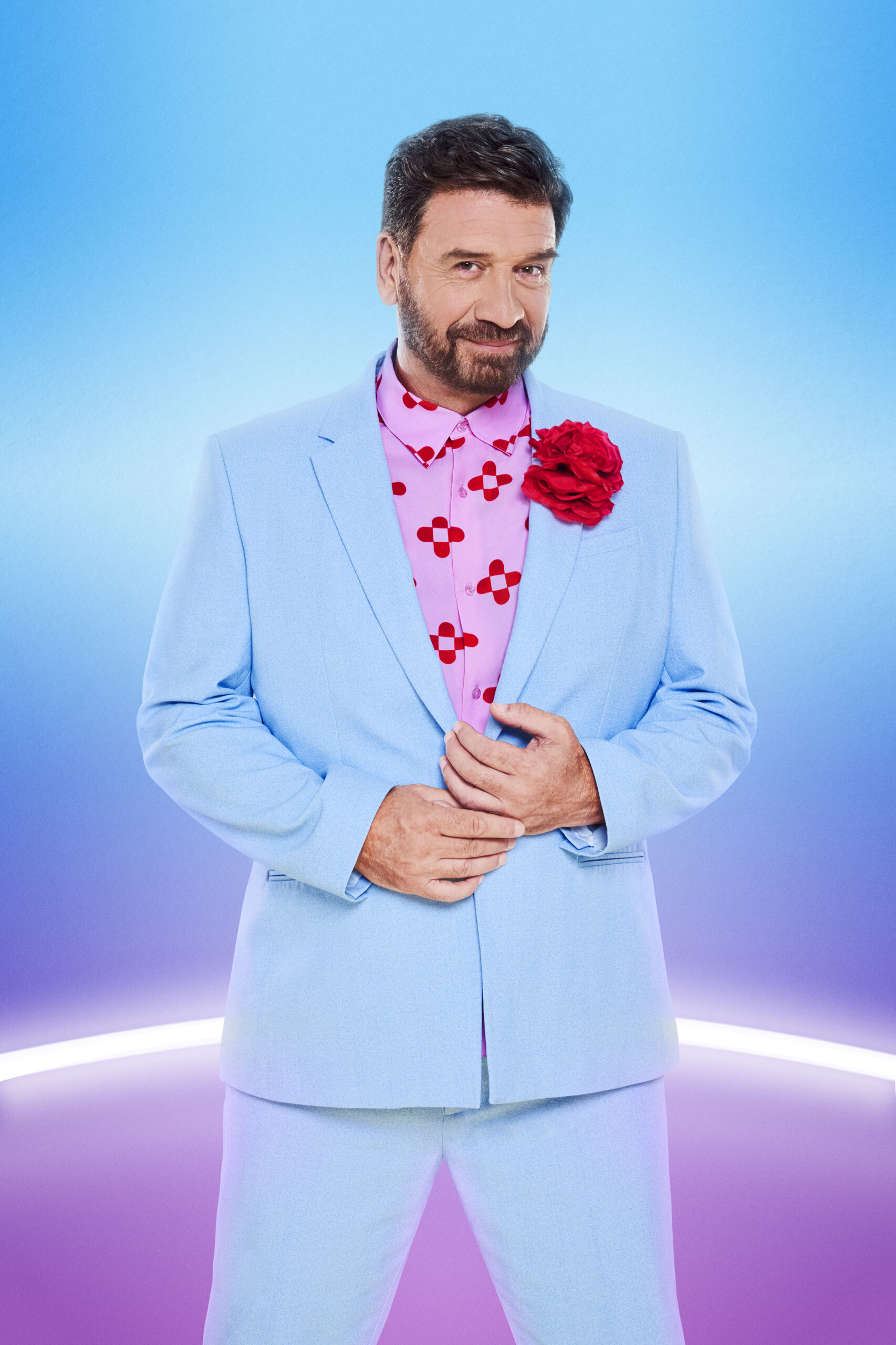 Nick Knowles in a blue suit in his Strictly headshot