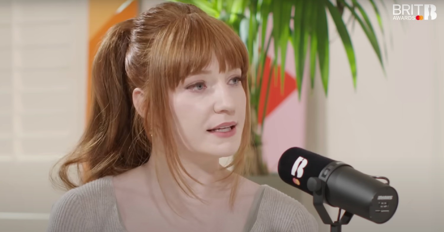 Nicola Roberts speaking on a podcast