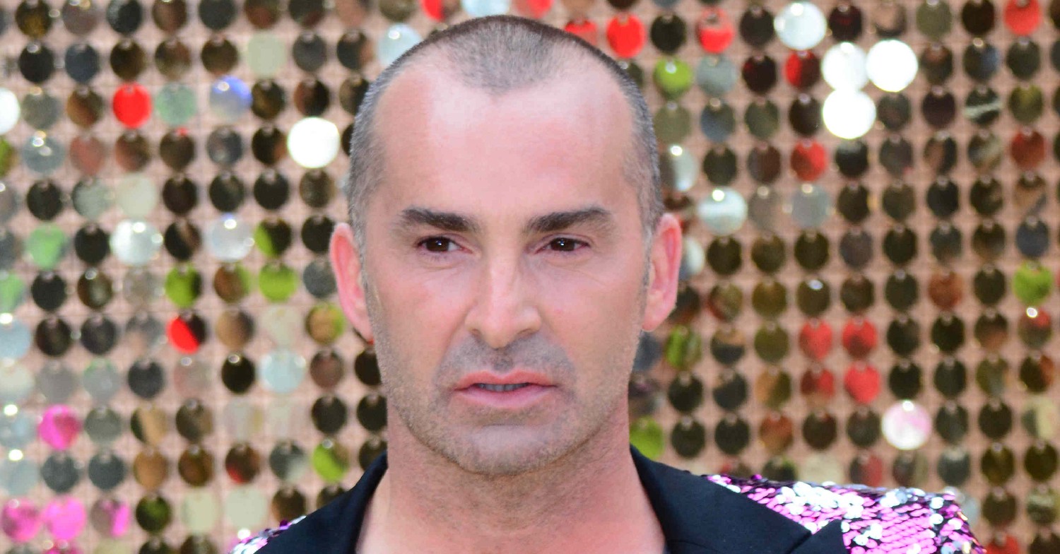 Louie Spence looks serious at event