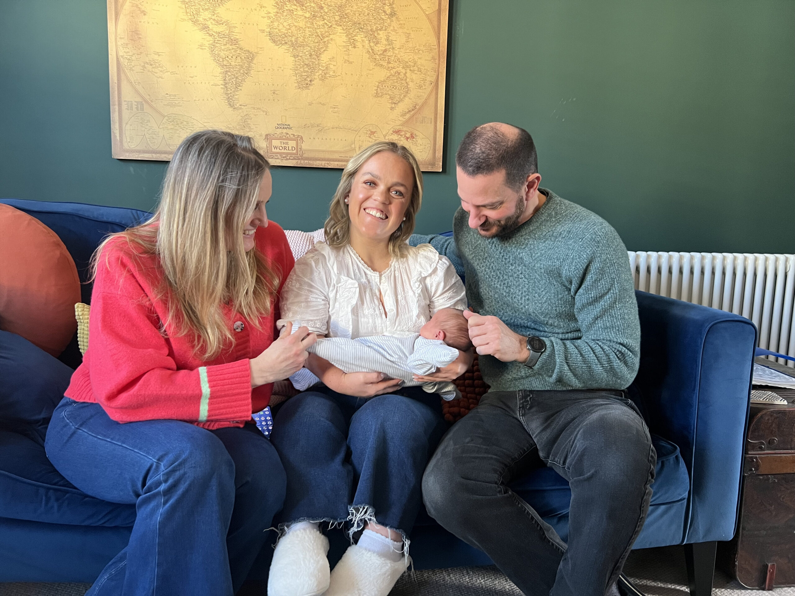 Ellie Simmonds holding a baby on her documentary